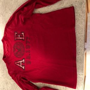 Young Men’s long sleeved Henley shirt, barely worn